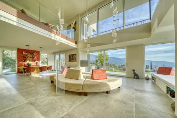 Contemporary villa with panoramic views of Lake Garda, set in private olive grove